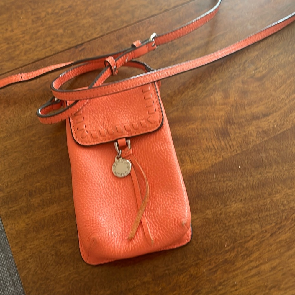 Rebecca Minkoff orange leather cellphone crossbody
